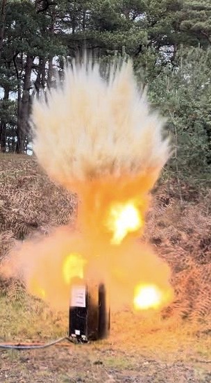 BattSimFX equipment producing a visible flame and smoke plume outdoors