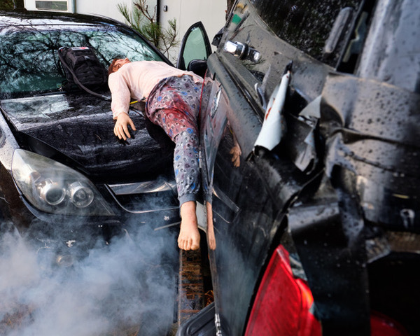Nautilus International Medical Simulation Training at a Roadside Traffic Collision, whereby a seriously injured high fidelity simulation mannequin is pinned between 2 vehicles and catastrophically bleeding