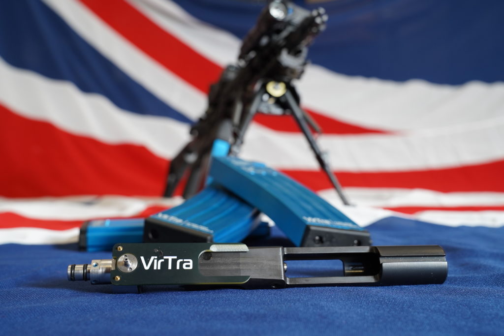 Nautilus International USA partner VirTra M16 drop-in Recoil Kit with Union Jack Flag background and CQC M16 rifle